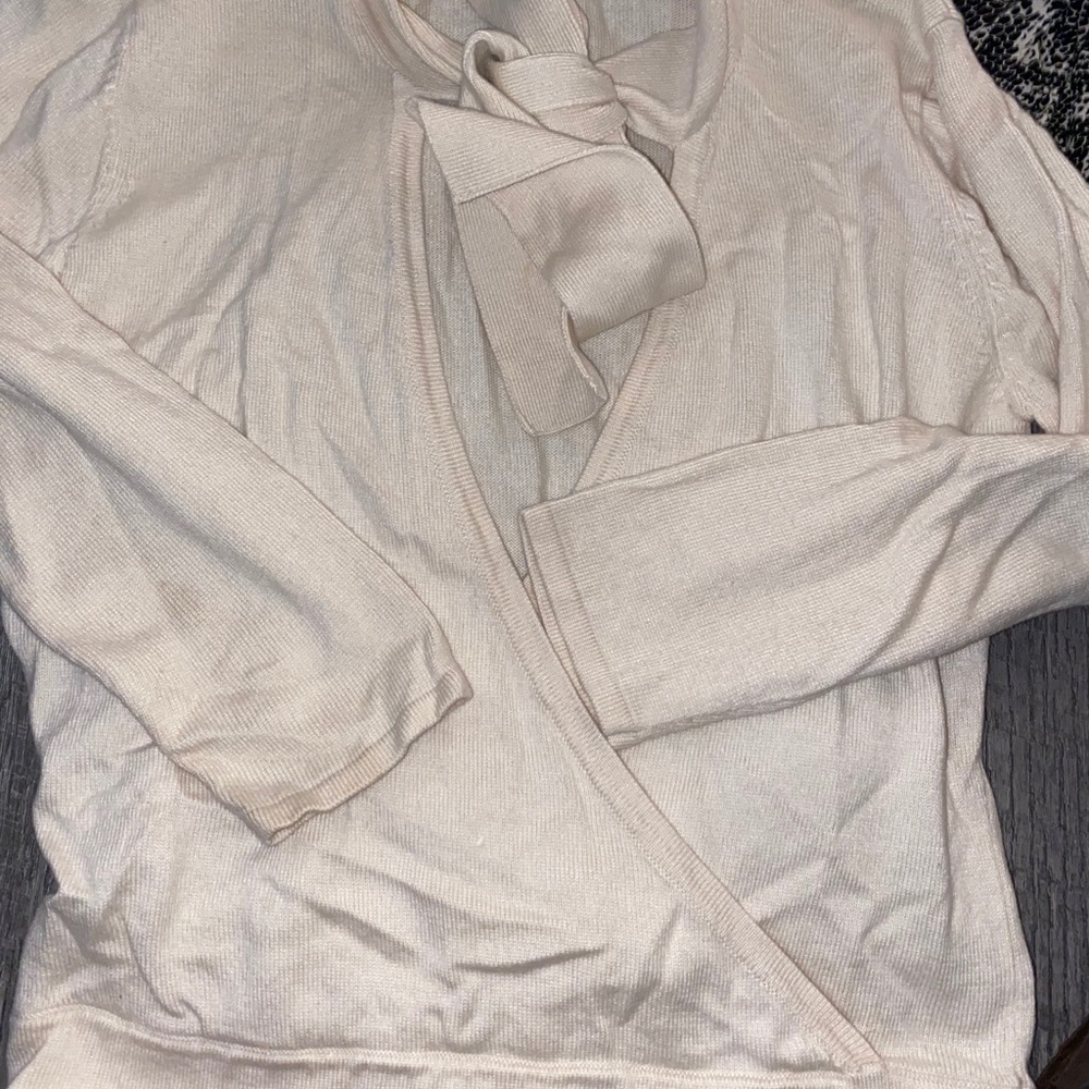 Tan sweater like material